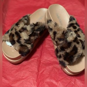 New leopard slippers size 6